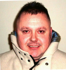 Levi Bellfield with his natural dark brown hair colour.
